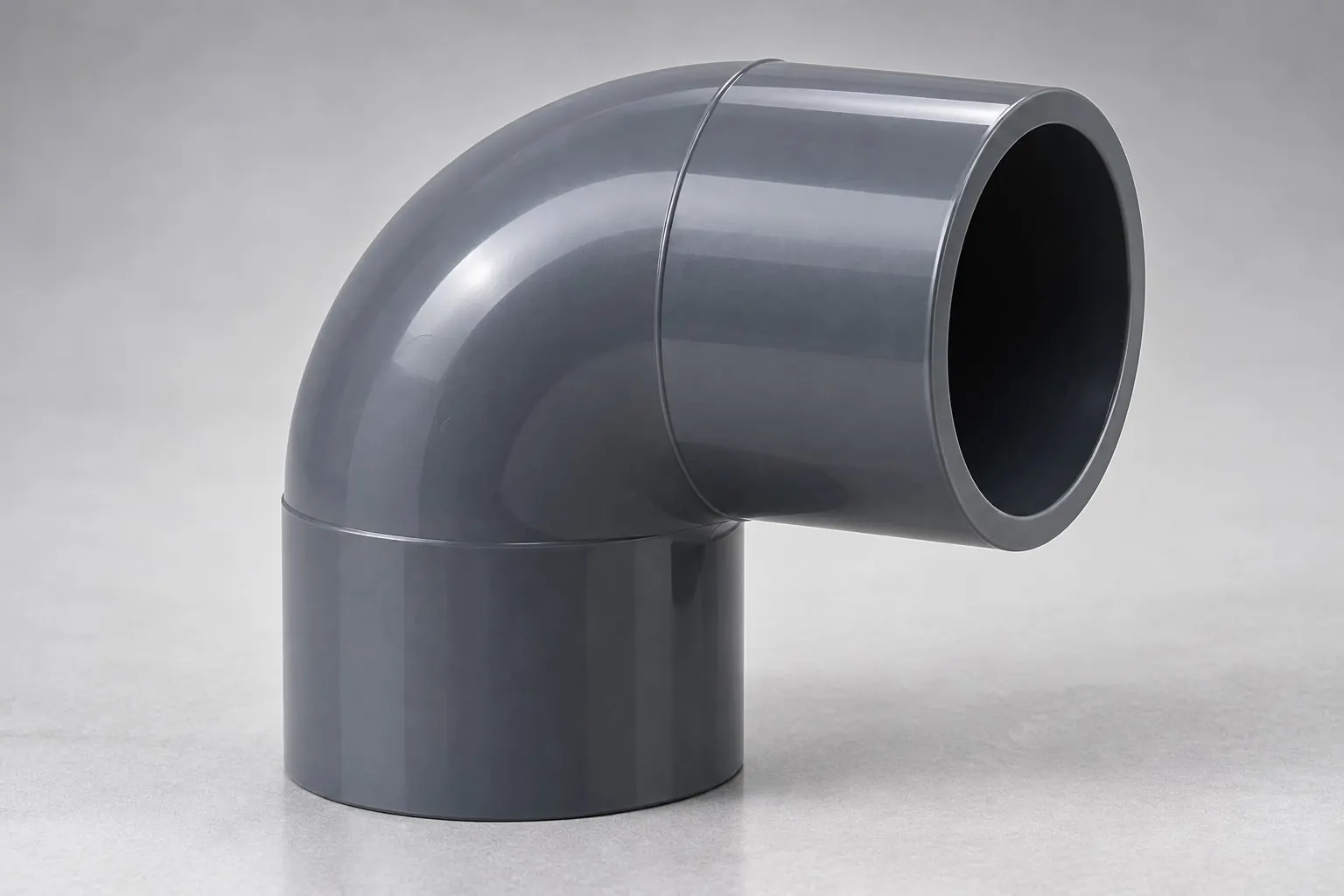 Codo de PVC gris para agua fría
