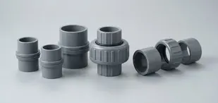 Uniones universales de PVC gris de distintas medidas